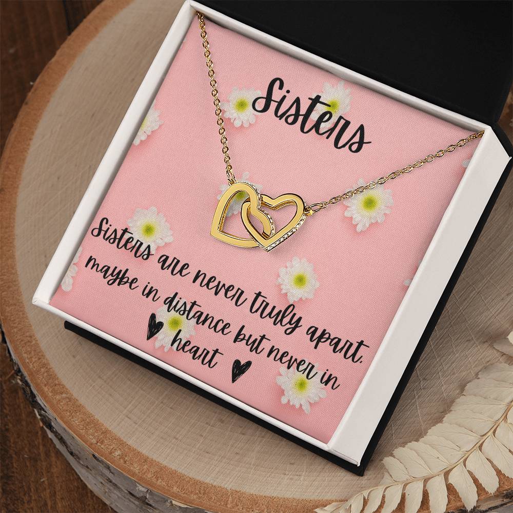 Sisters - Interlocking Necklace - Daisy Background Interlocking Hearts Necklace