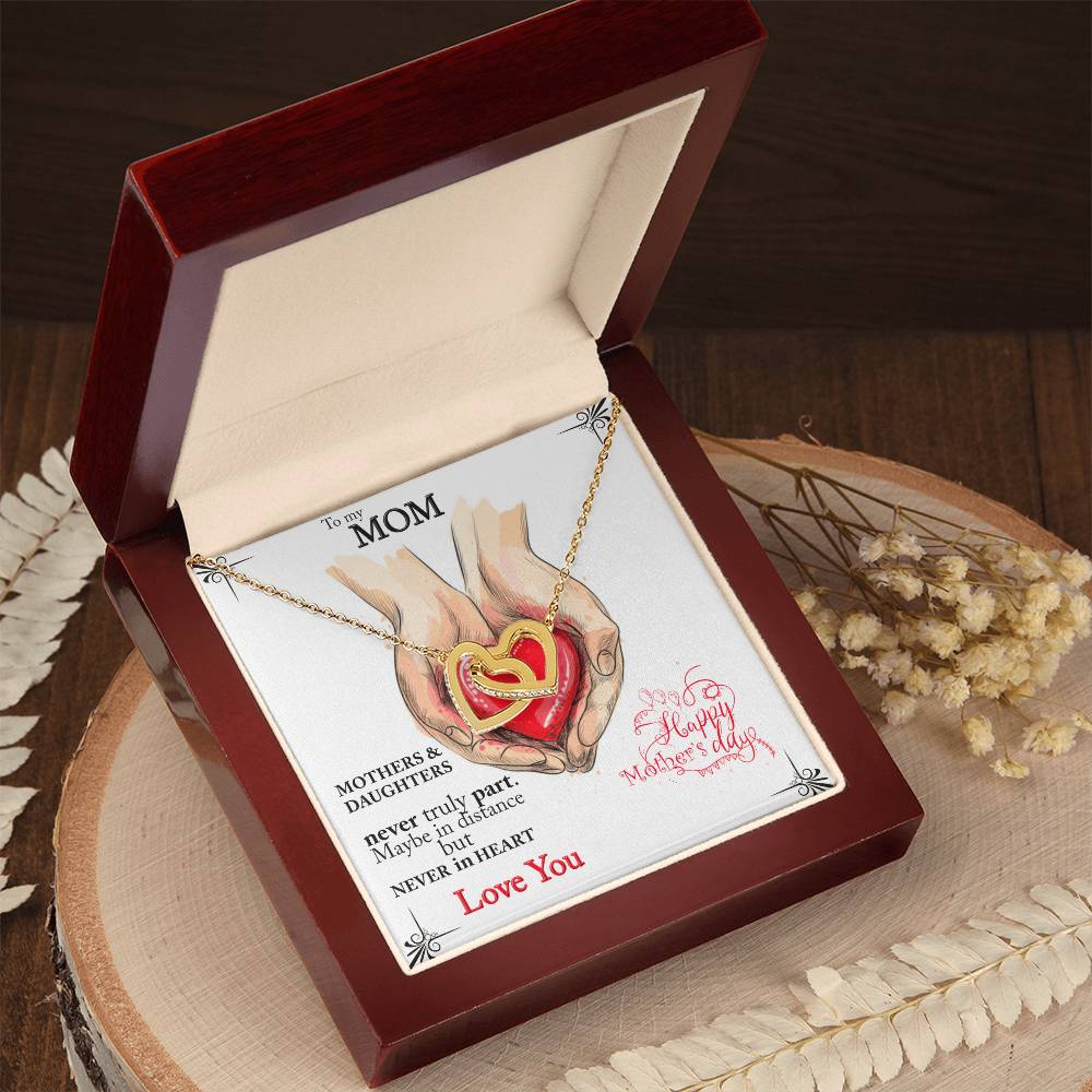 Mothers And Daughters Never Truly Part. Beautiful Necklace For Your Mom. Interlocking Hearts Necklace